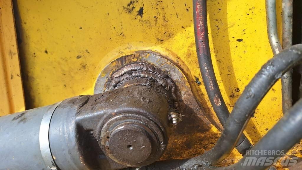 New Holland B 115 لوادر ذات جرافات عكسية