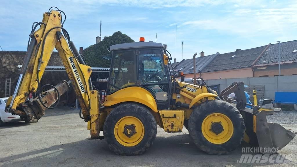 New Holland B 115 لوادر ذات جرافات عكسية
