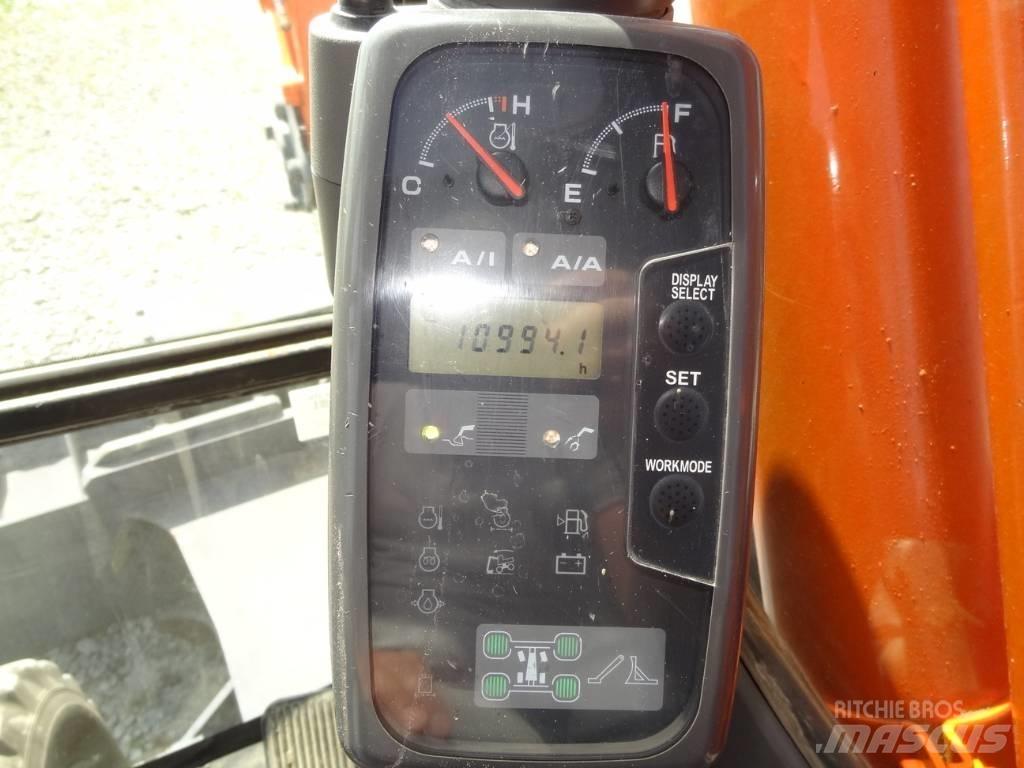 Hitachi ZX 160 W حفارات بعجل