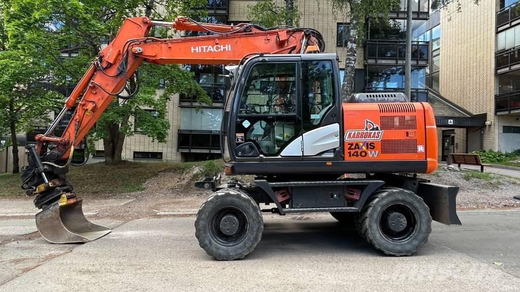 Hitachi ZX140W-5B حفارات بعجل