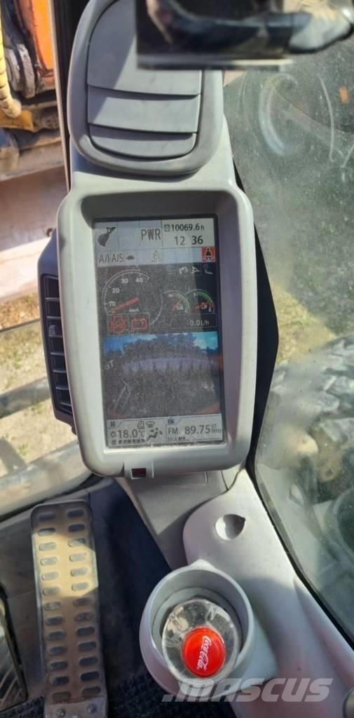Hitachi ZX140W-5B حفارات بعجل