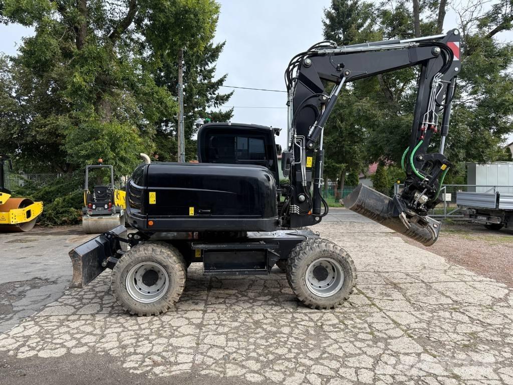 Yanmar B 110 W حفارات بعجل