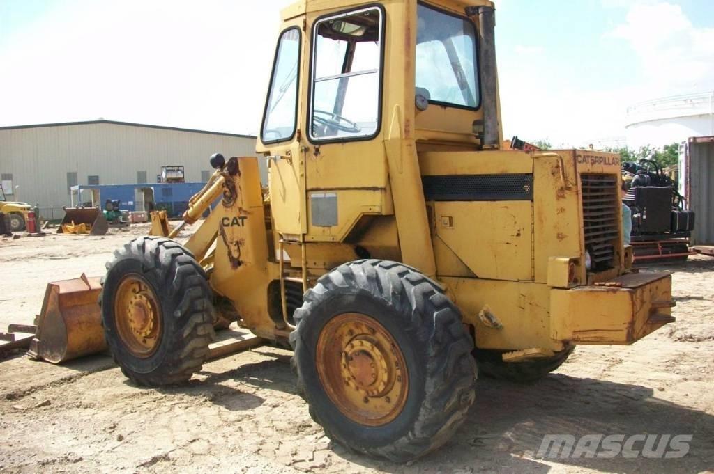 CAT 910 لوادر بعجل