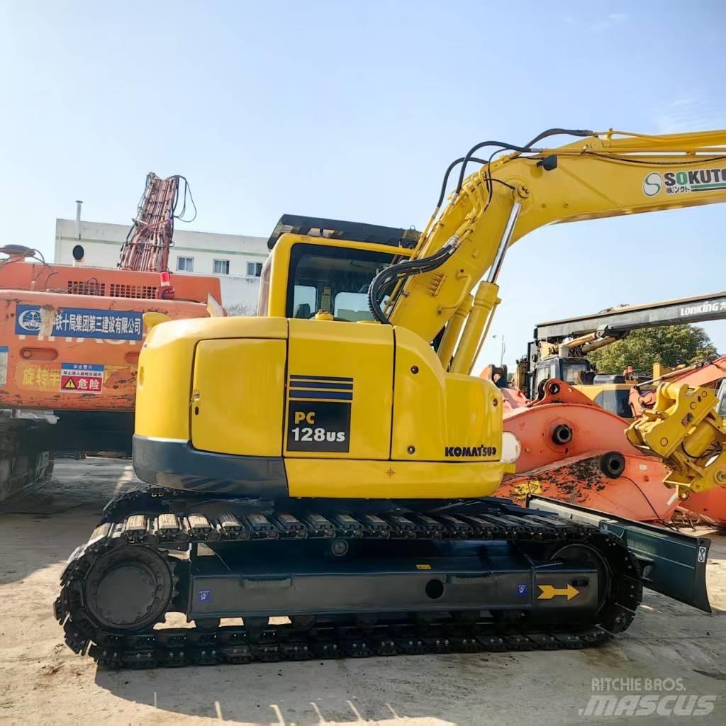 Komatsu PC 128 US حفارات وسط 7 طن - 12 طن