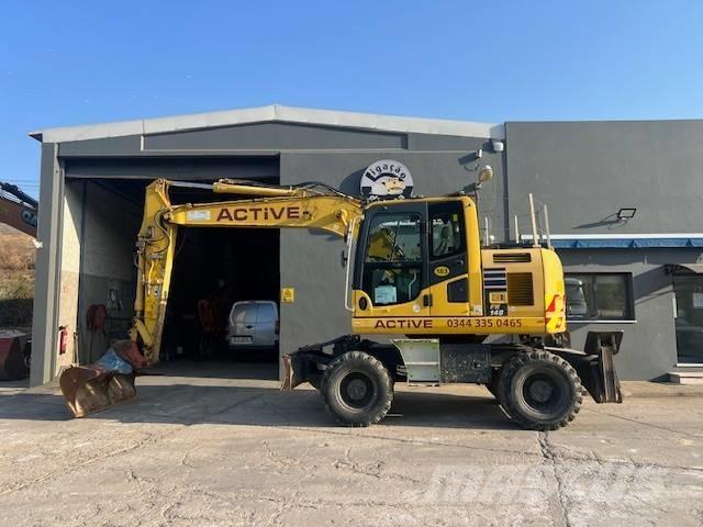 Komatsu PW 148 حفارات بعجل