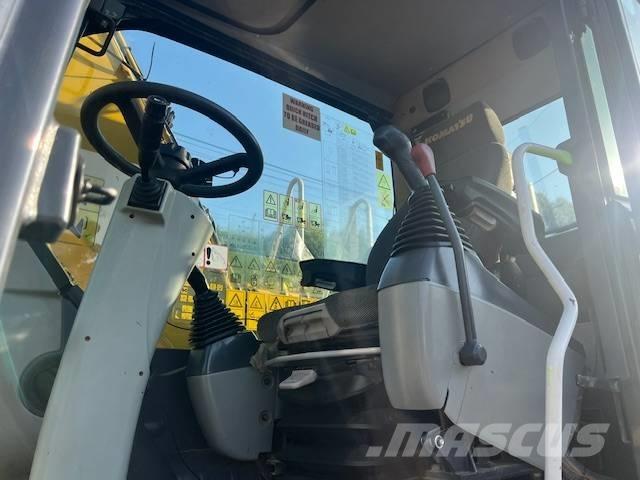 Komatsu PW 148 حفارات بعجل