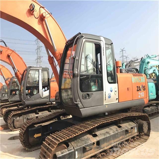 Hitachi zx210 حفارات زحافة