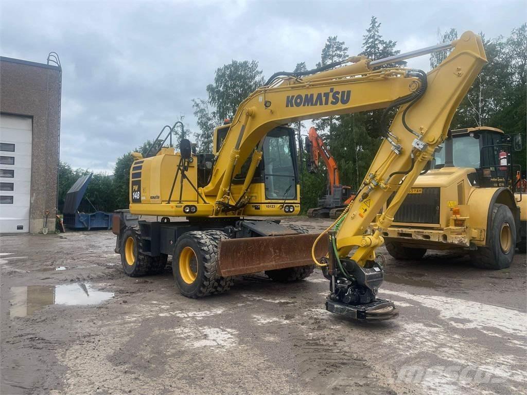 Komatsu PW148-10 حفارات بعجل