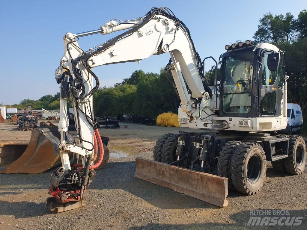 Komatsu PW118MR-11 حفارات بعجل