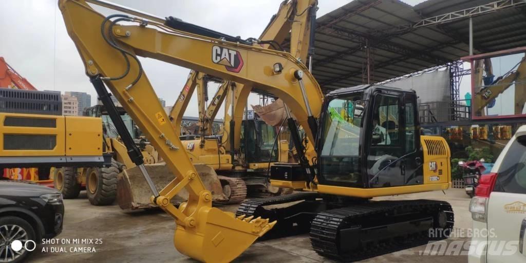 CAT 2021 CAT 313D2GC حفارات بعجل