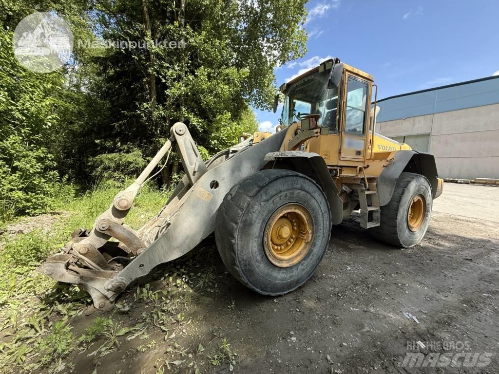 Volvo L 120 لوادر بعجل