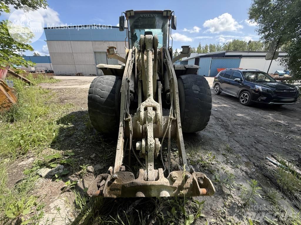 Volvo L 120 لوادر بعجل