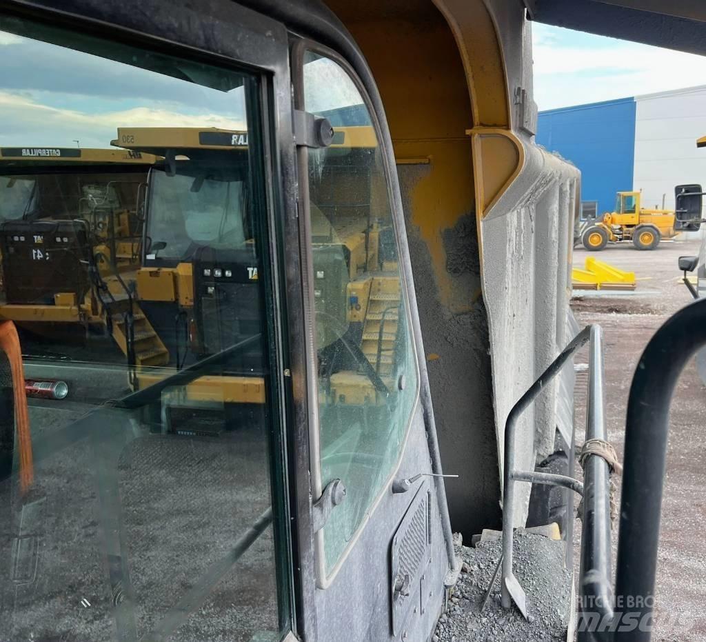 CAT 775 G شاحنات المخلفات الصلبة