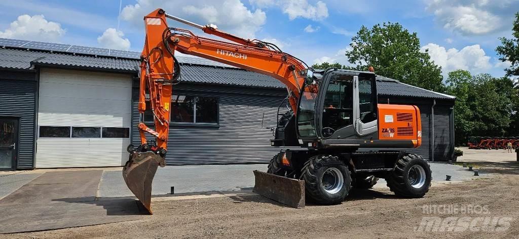 Hitachi ZX140-3 حفارات بعجل