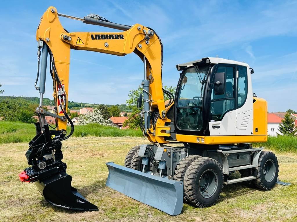 Liebherr A 910 Comp حفارات بعجل