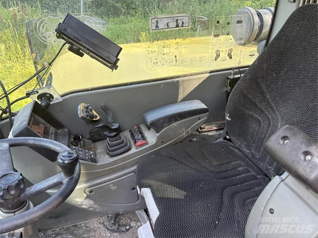 Yanmar B110W حفارات بعجل
