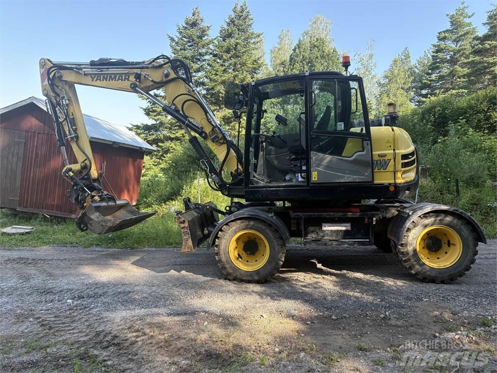 Yanmar B110W حفارات بعجل