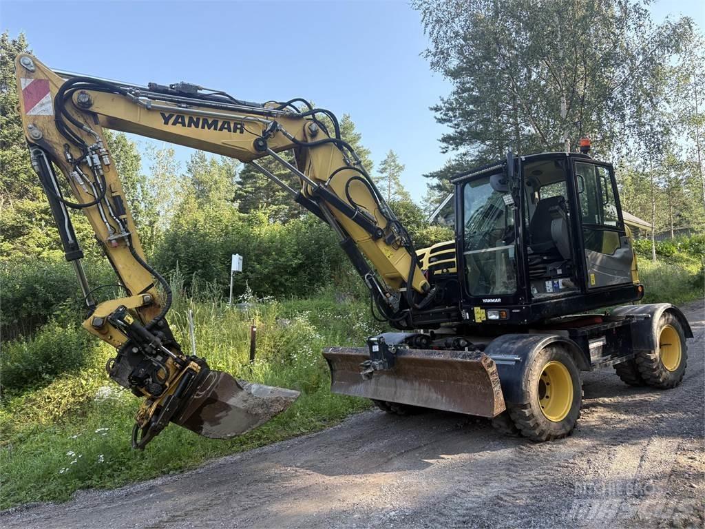Yanmar B110W حفارات بعجل