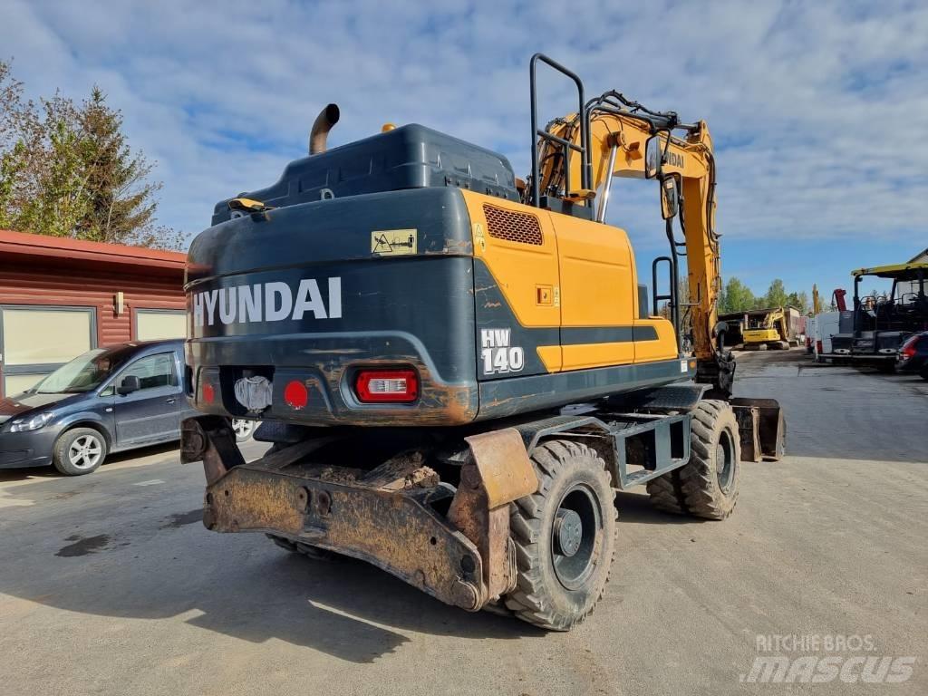 Hyundai HW 140 حفارات بعجل