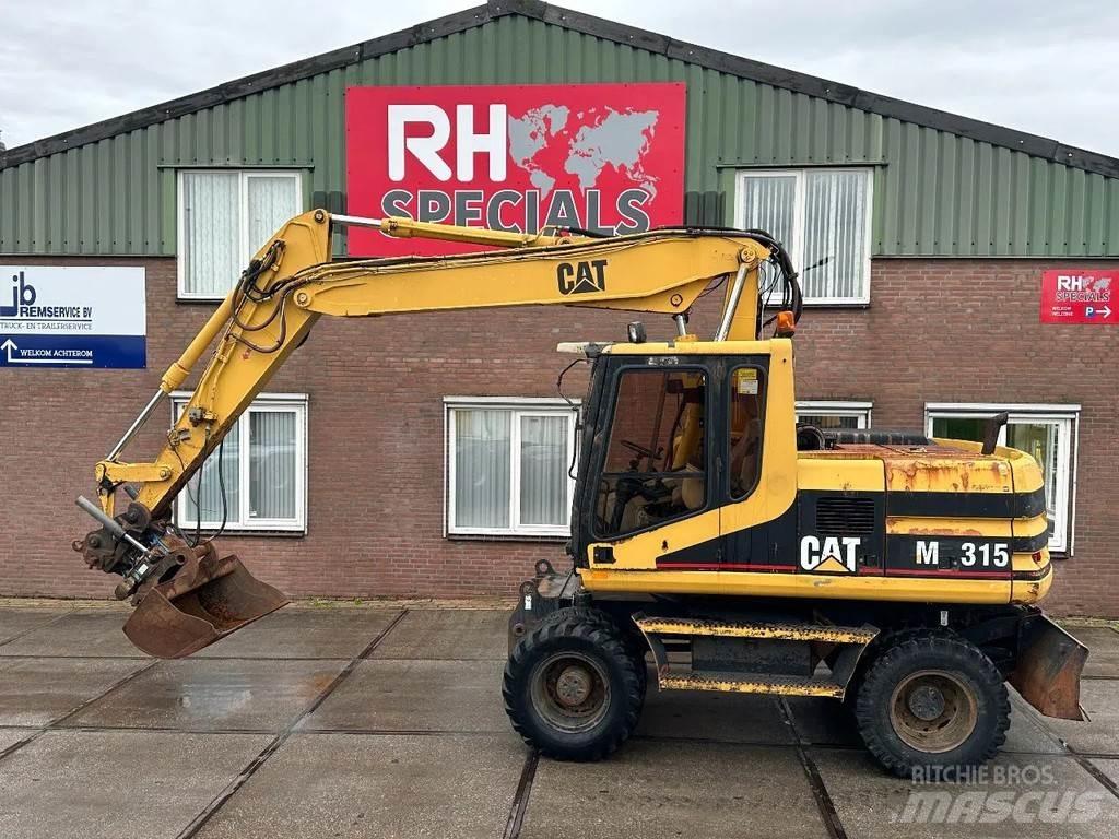 CAT M315 +ROTO CE حفارات بعجل