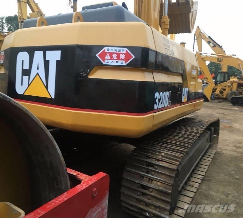 CAT 320 B حفارات زحافة