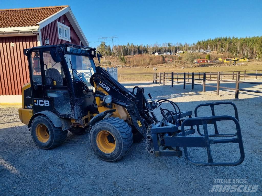 JCB 403 لوادر انزلاقية التوجيه
