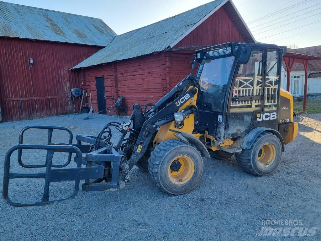 JCB 403 لوادر انزلاقية التوجيه
