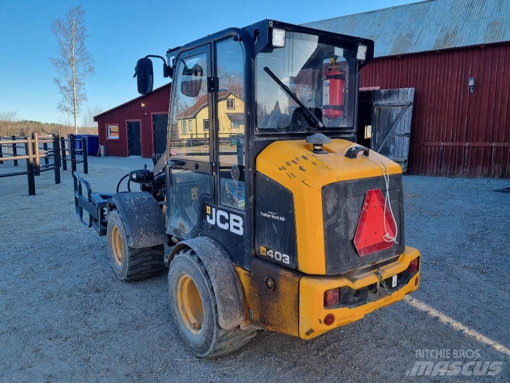 JCB 403 لوادر انزلاقية التوجيه