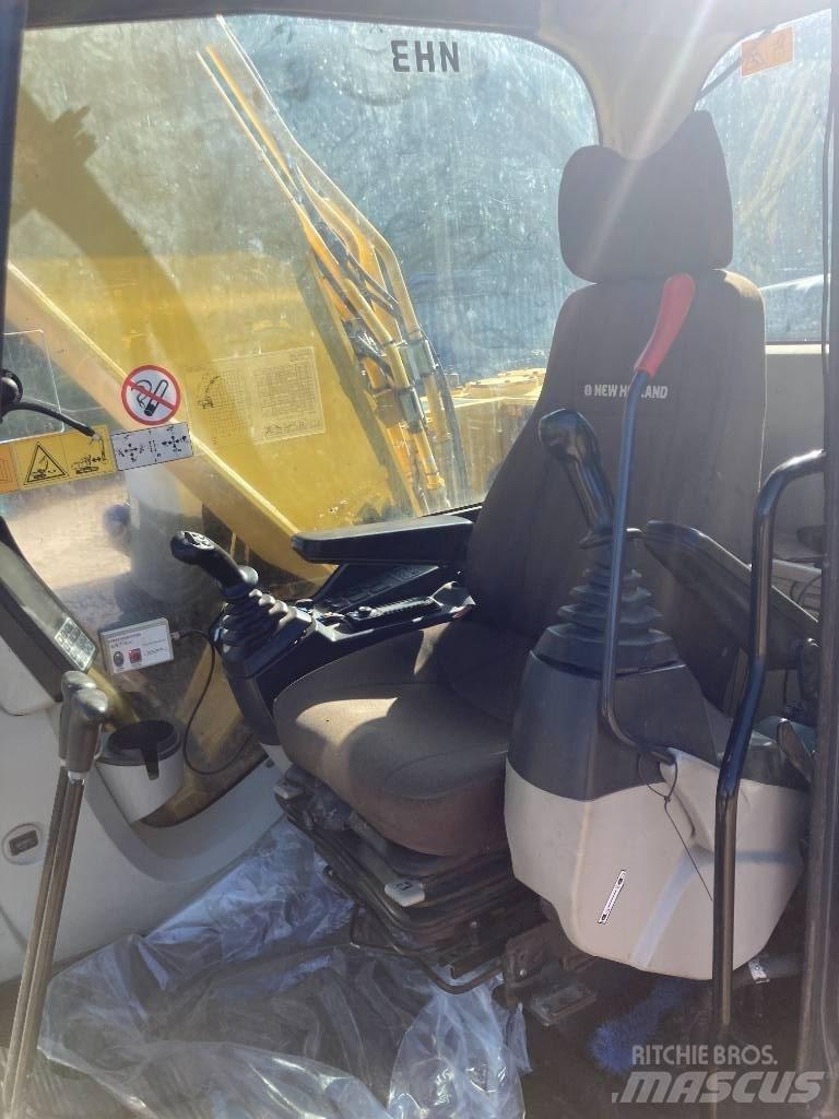 New Holland E 215 C حفارات زحافة