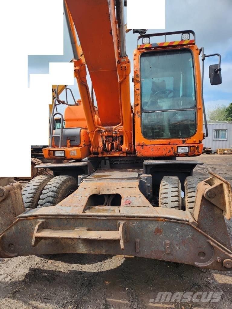 Doosan DX 210WA حفارات بعجل