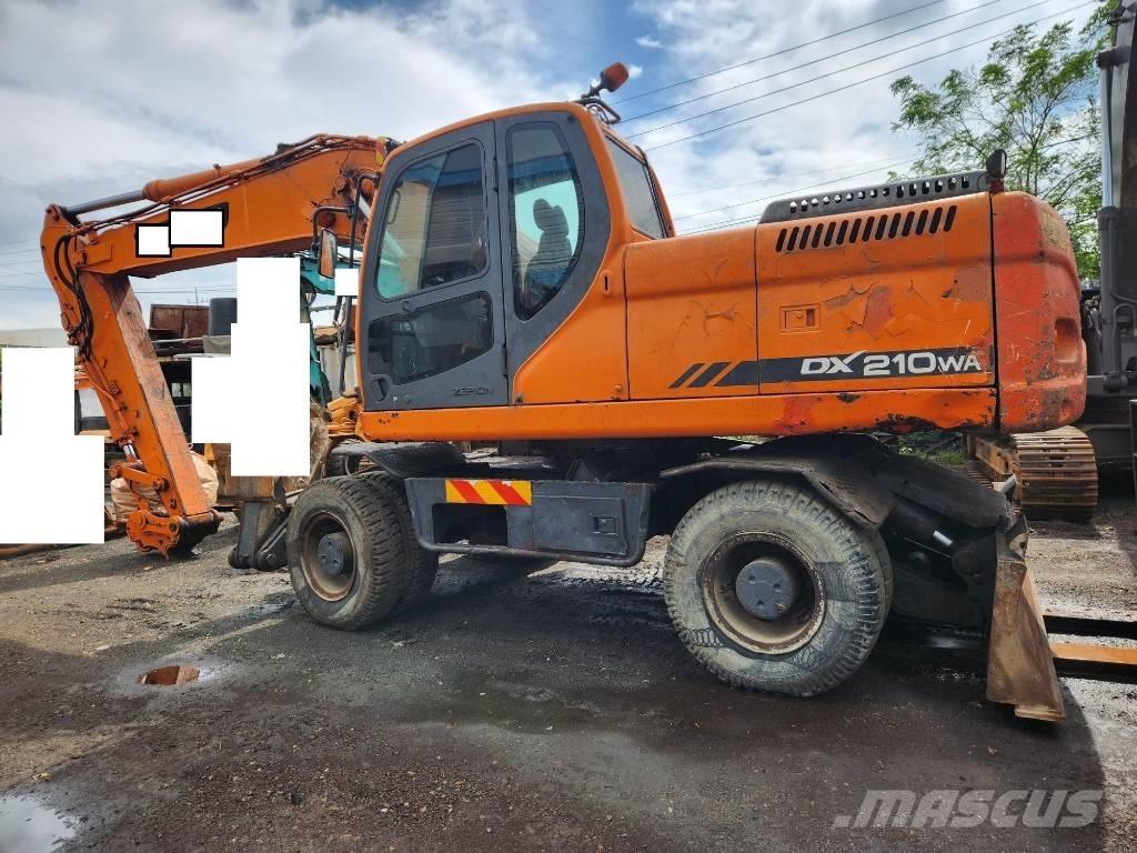 Doosan DX 210WA حفارات بعجل