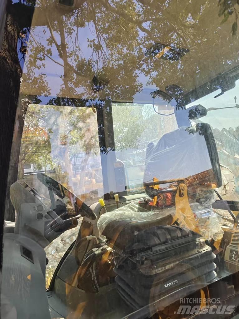 JCB 4 CX لوادر ذات جرافات عكسية