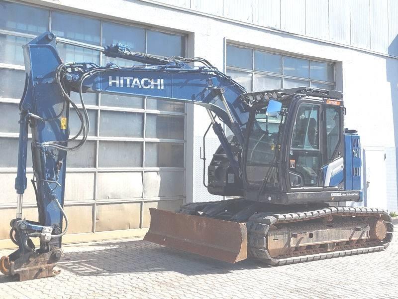 Hitachi ZX 135 US-7 حفارات زحافة