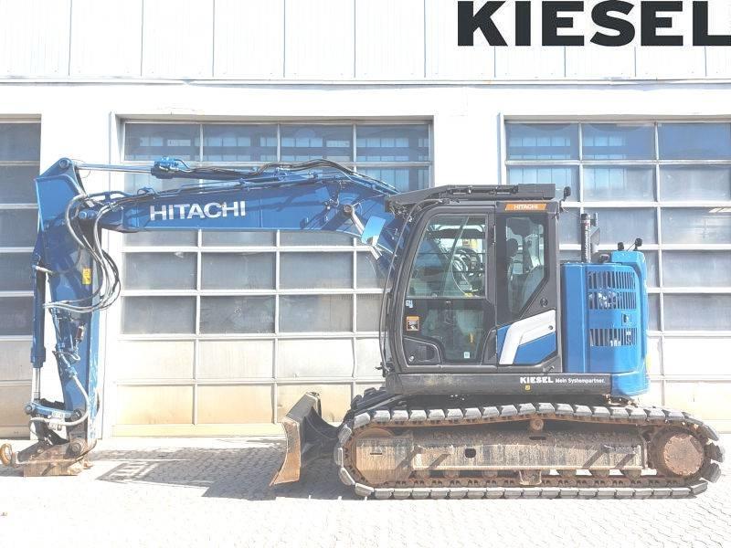 Hitachi ZX 135 US-7 حفارات زحافة
