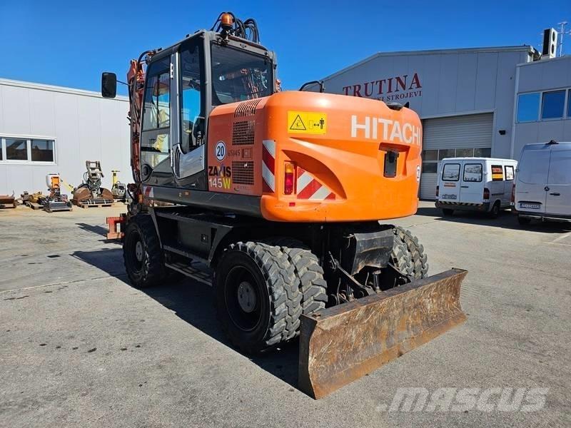 Hitachi ZX 145 W-3 حفارات بعجل
