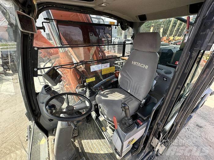 Hitachi ZX140W-6 حفارات بعجل