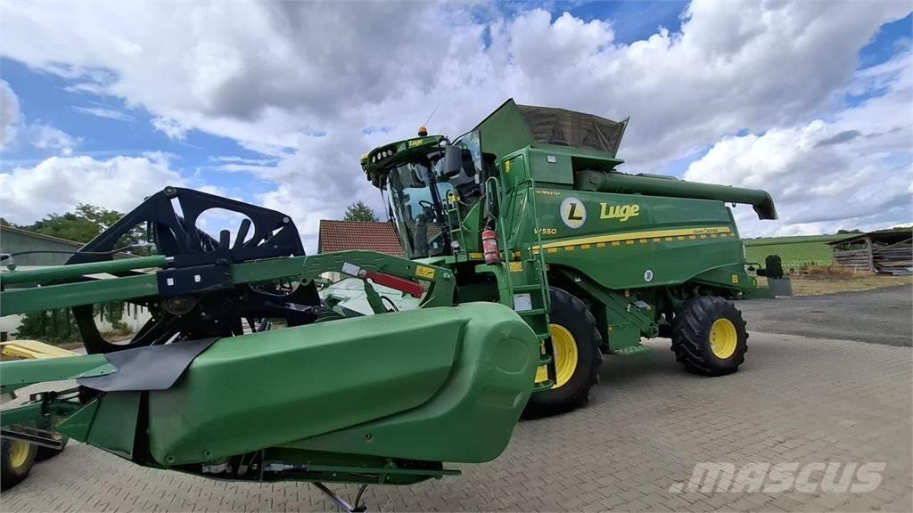 John Deere T560 HM حصادات