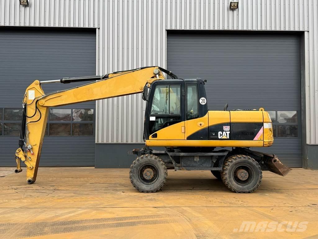 CAT M315D حفارات بعجل
