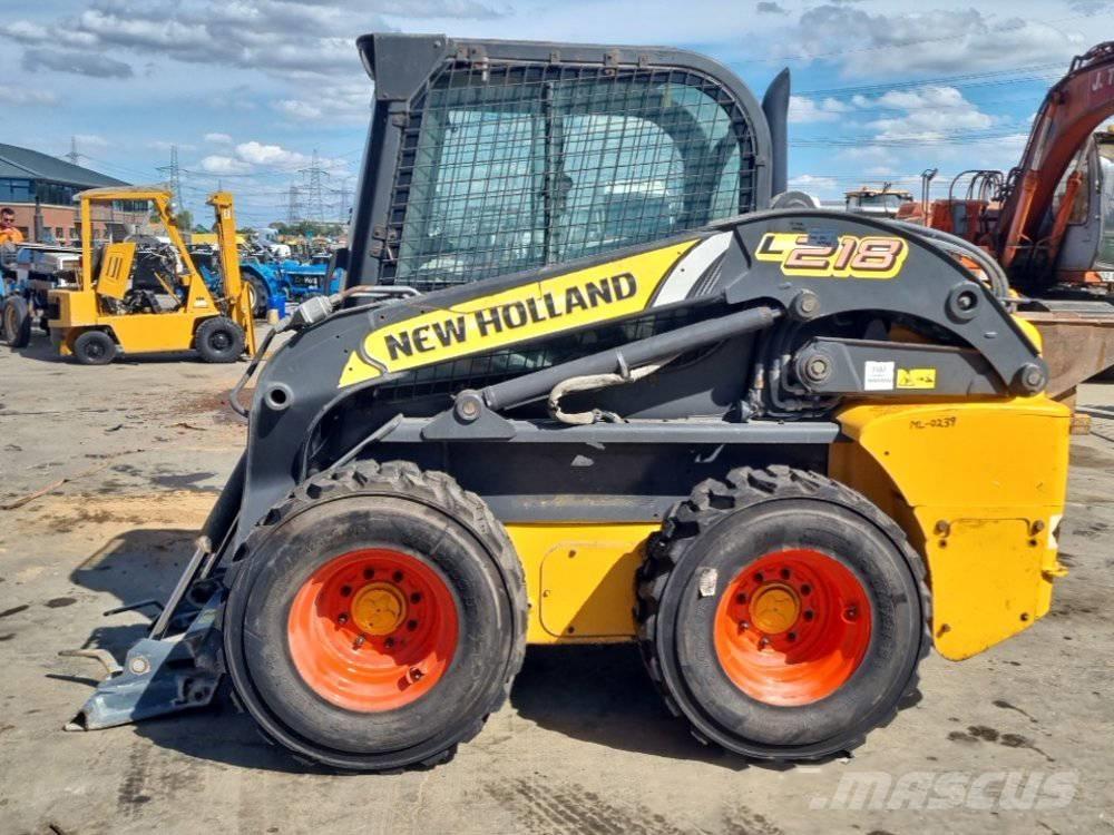 New Holland L 218 لوادر انزلاقية التوجيه