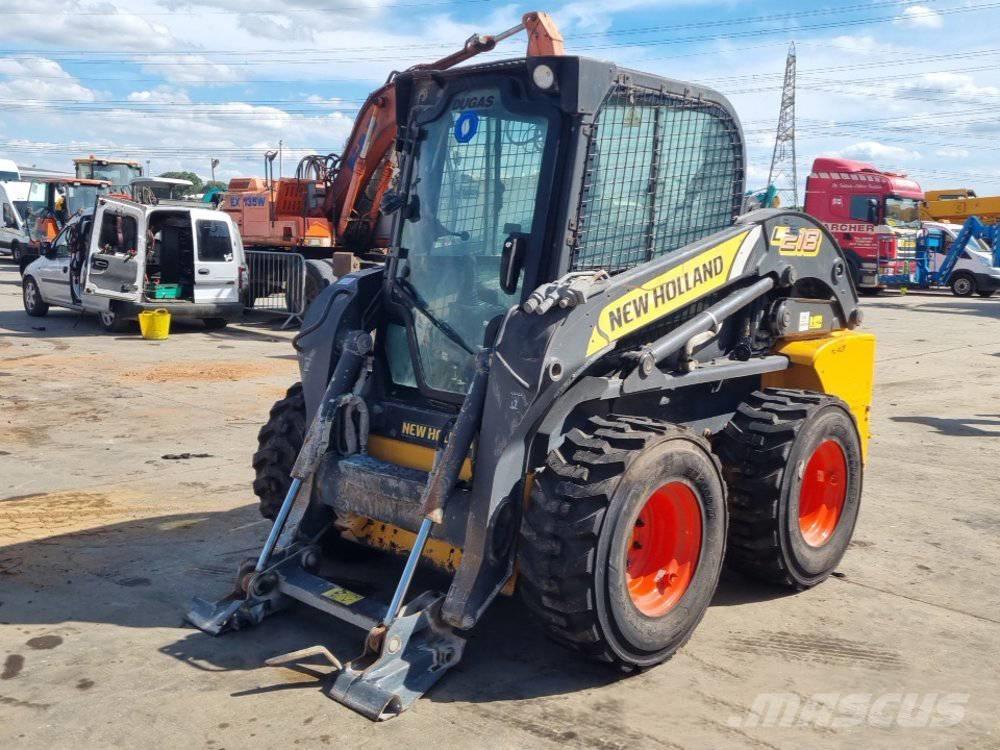 New Holland L 218 لوادر انزلاقية التوجيه