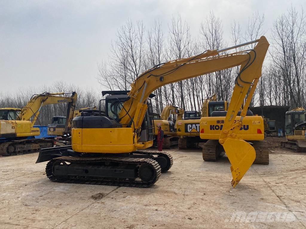 Komatsu PC128US حفارات زحافة