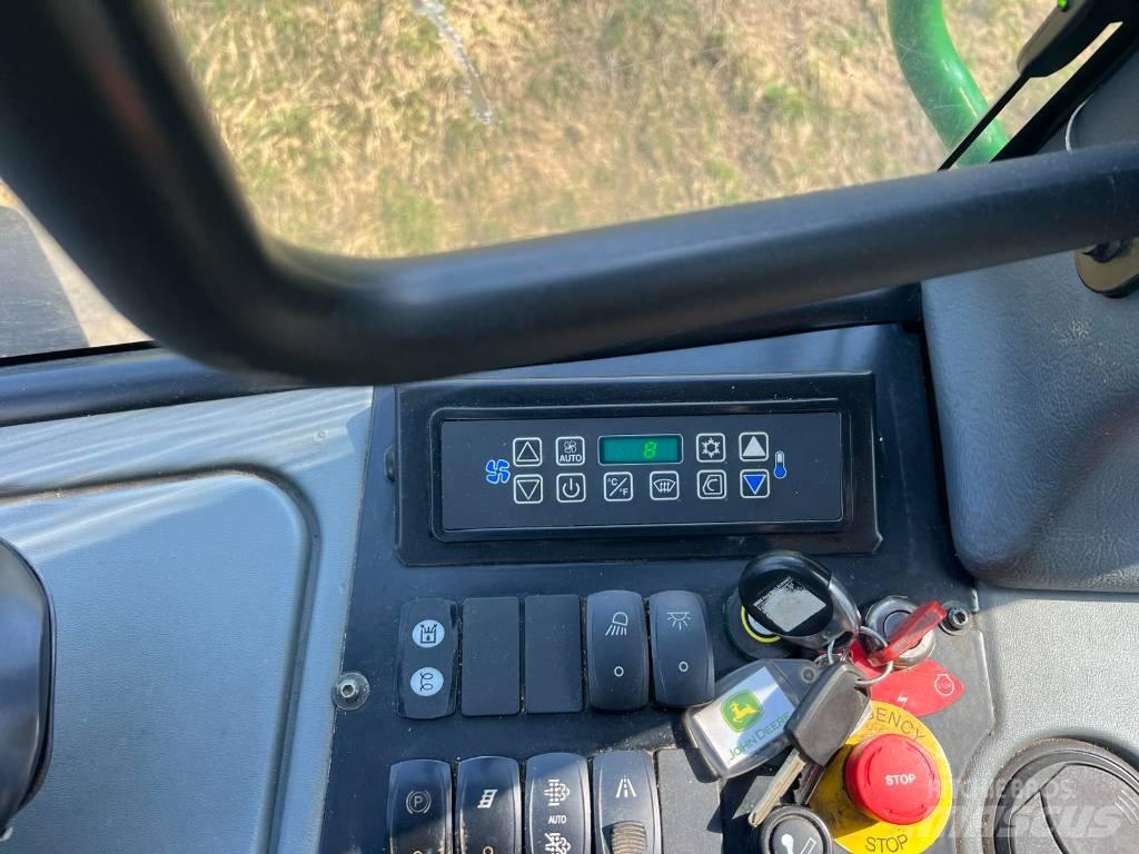 John Deere 1210 E شاحنات