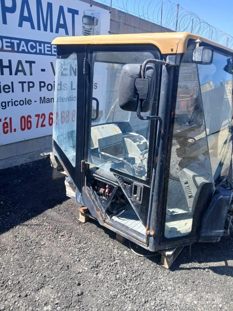 CAT 906 كابينة والداخلية
