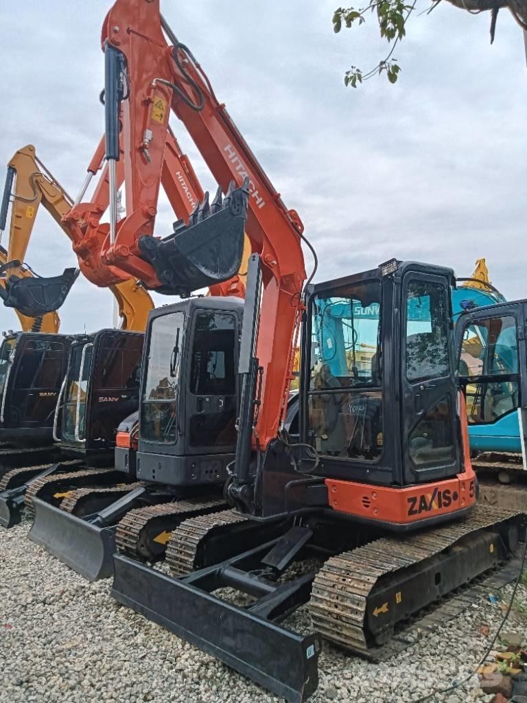 Hitachi zx55 حفارات زحافة