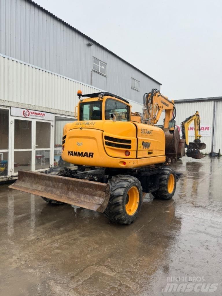 Yanmar B95W (40496) حفارات بعجل