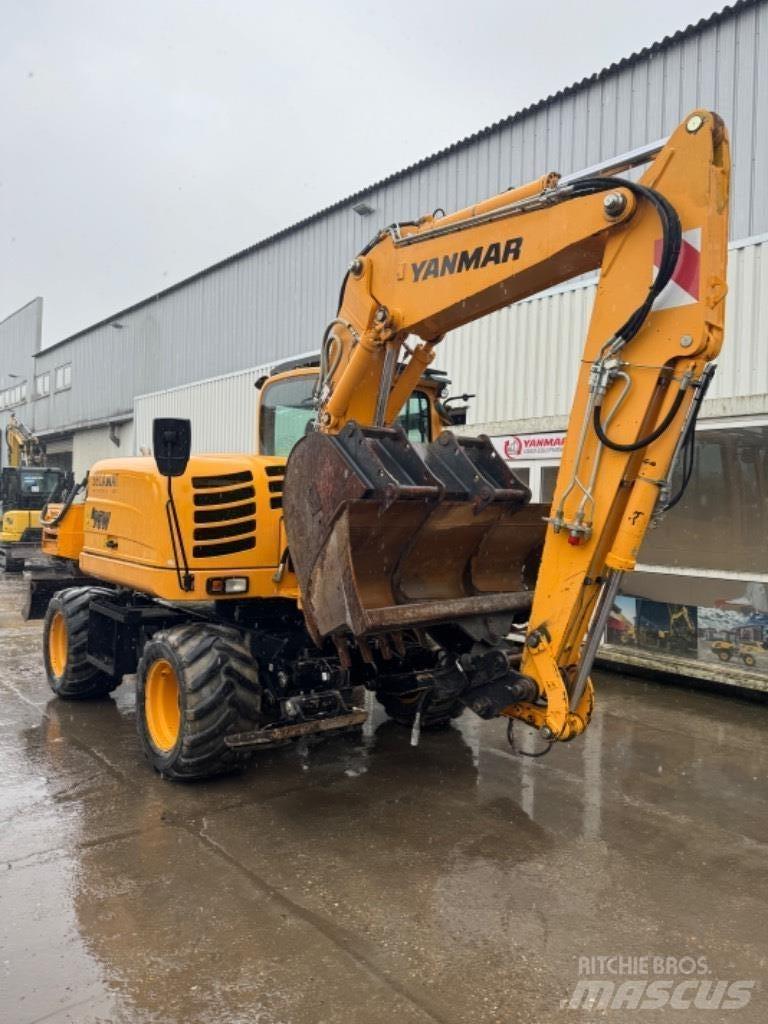 Yanmar B95W (40496) حفارات بعجل