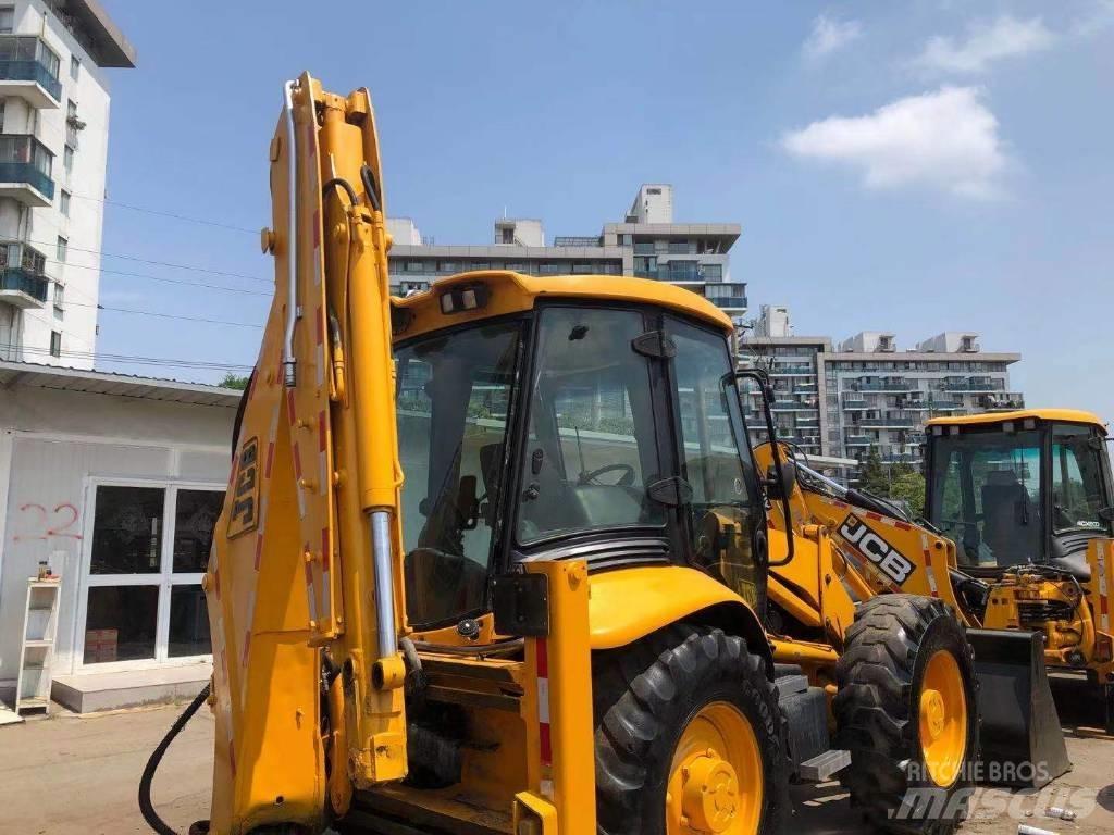 JCB 4 CX لوادر ذات جرافات عكسية