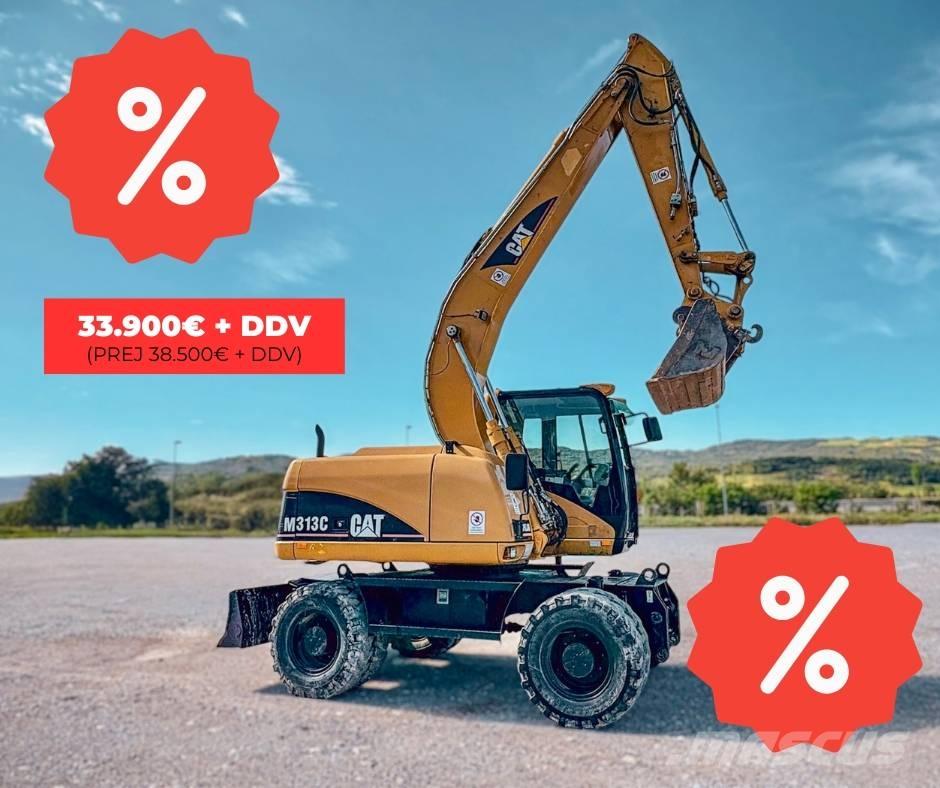CAT M 313 C حفارات بعجل