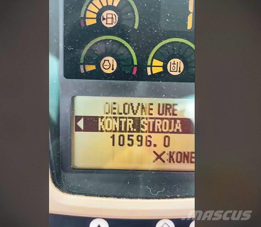 CAT M 313 C حفارات بعجل