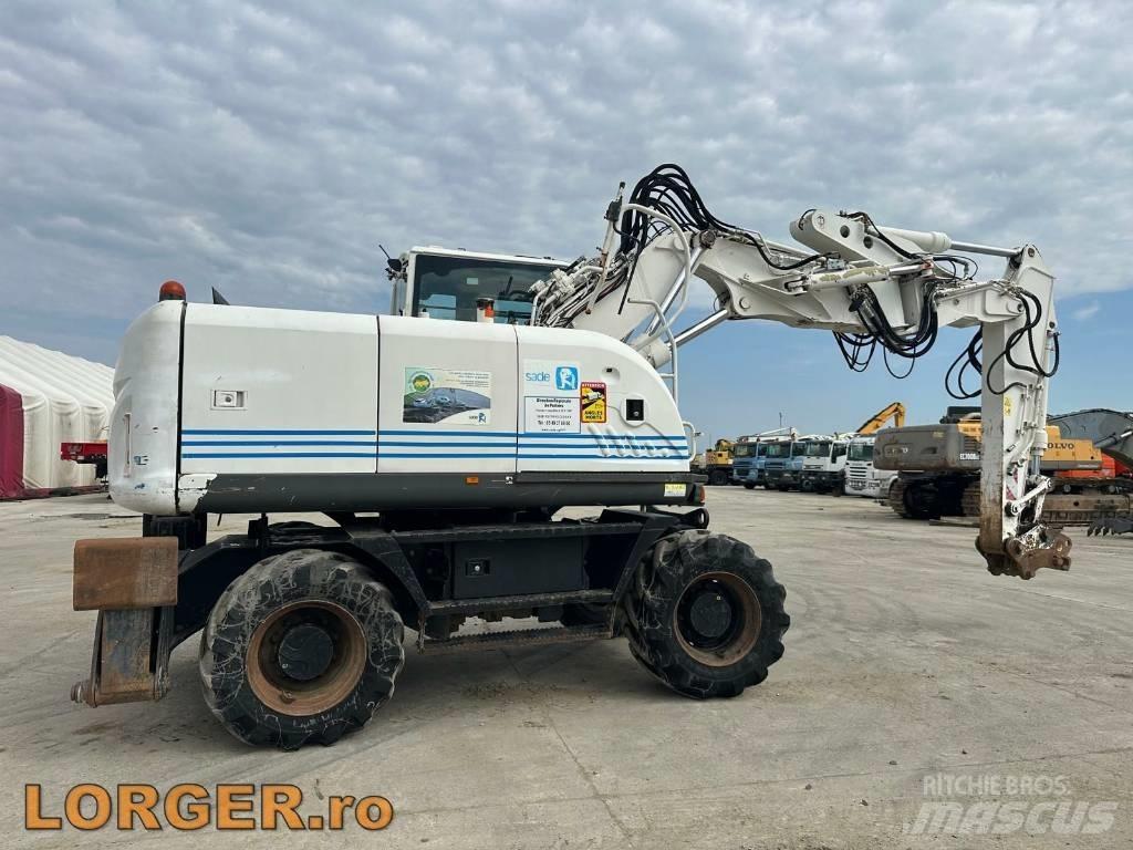 Hitachi ZX 140 W-3 حفارات بعجل